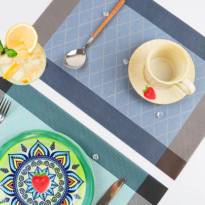 CADONO Placemats Set of 4 Washable Indoor/Outdoor Vinyl Place Mats for Dining Table Durable Non-Slip Heat Resistant PVC Weave Table Mats（Rhombus-Blue）