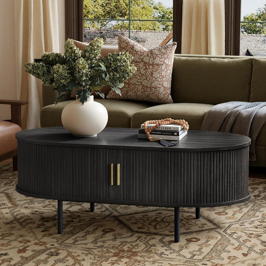 Modern Coffee Table with Storage, 47.2" Oval Fluted Coffee Table with Sliding Doors, Minimalist Tea Table with Wood Grain Veneer, Mid Century Center Tables for Living Room, Apartment, Black